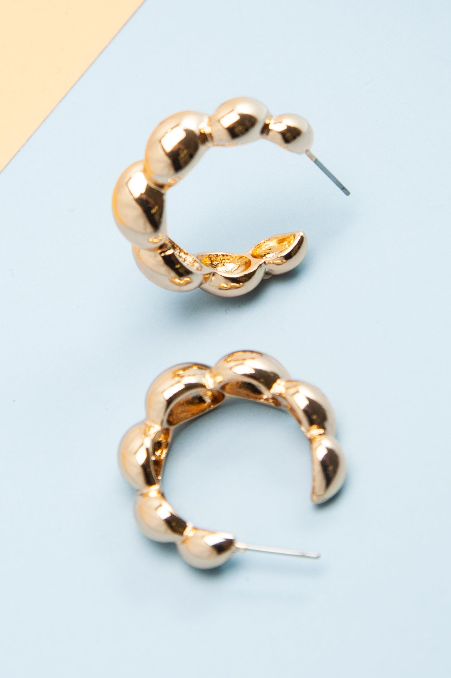 THE TWIST BUBBLE HOOP EARRINGS IN GOLD