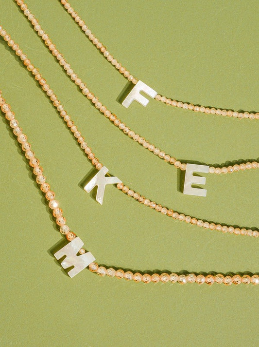 THE BEADED ALPHABET CHOKER IN NATURAL