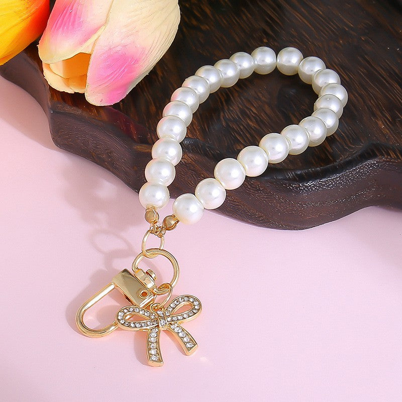 THE PEARL BOW WRISTLET