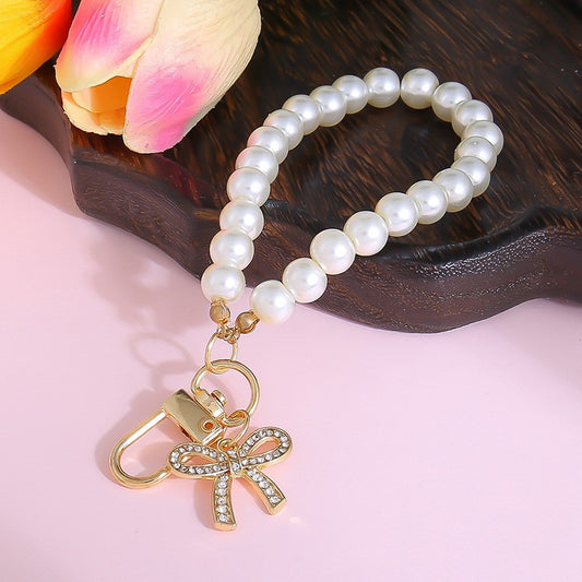 THE PEARL BOW WRISTLET