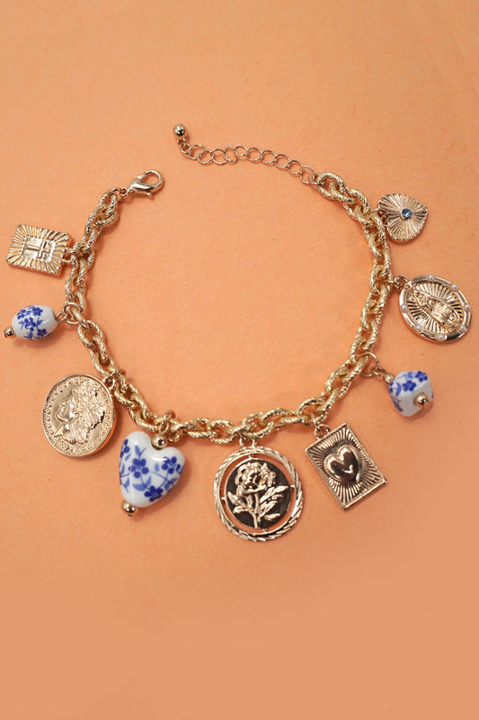 THE ANTIQUE CHARM BRACELET IN GOLD