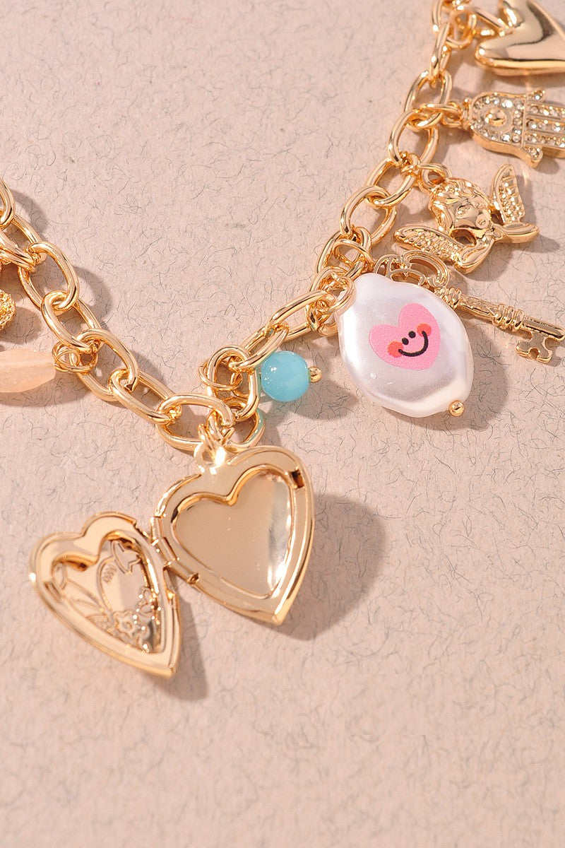 THE HAMDA CHARM NECKLACE IN GOLD