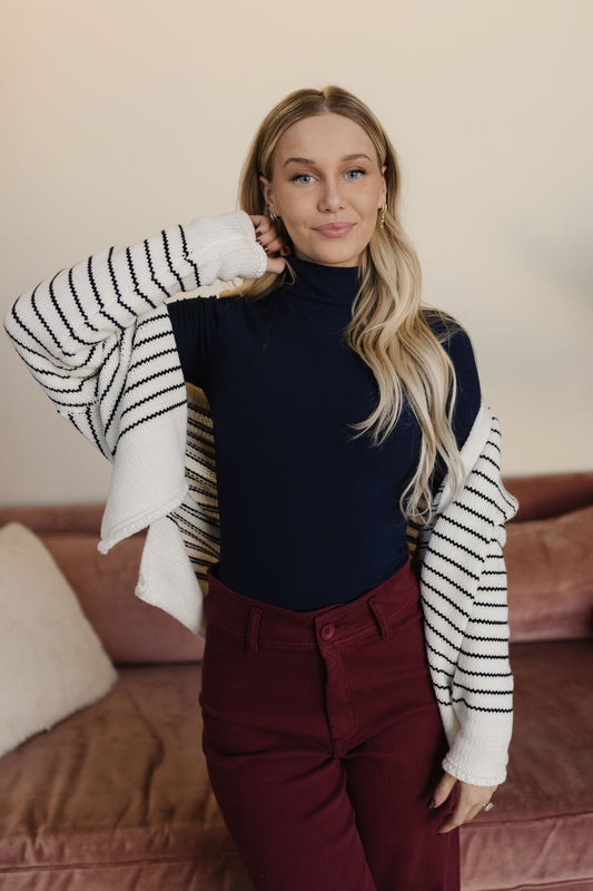 THE CONNER RIBBED TURTLENECK IN NAVY