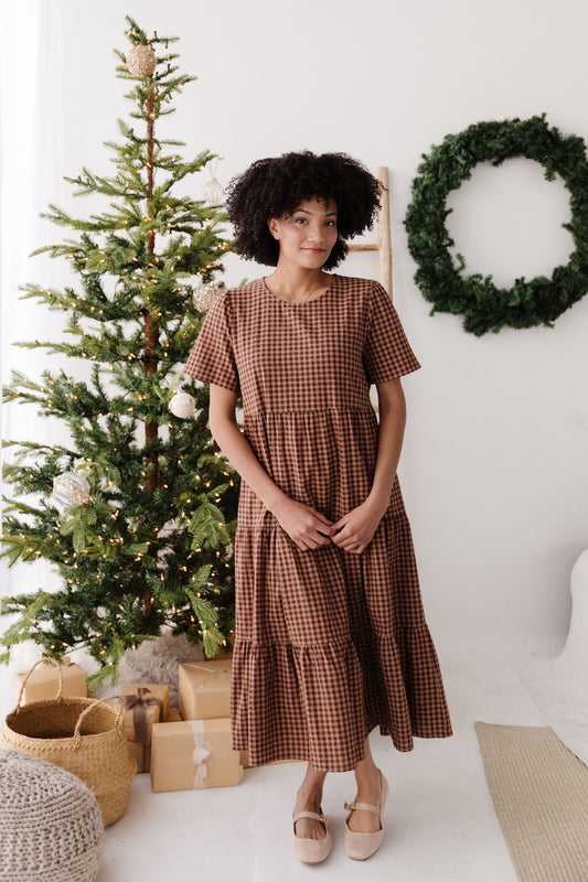 THE GILLIAN GINGHAM TIERED DRESS IN BROWN