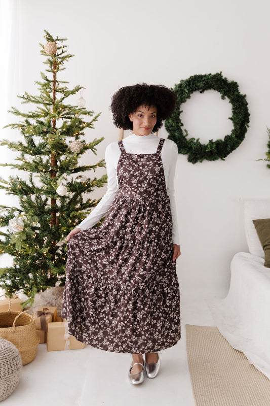 THE DANNY FLORAL OVERALL DRESS IN BROWN