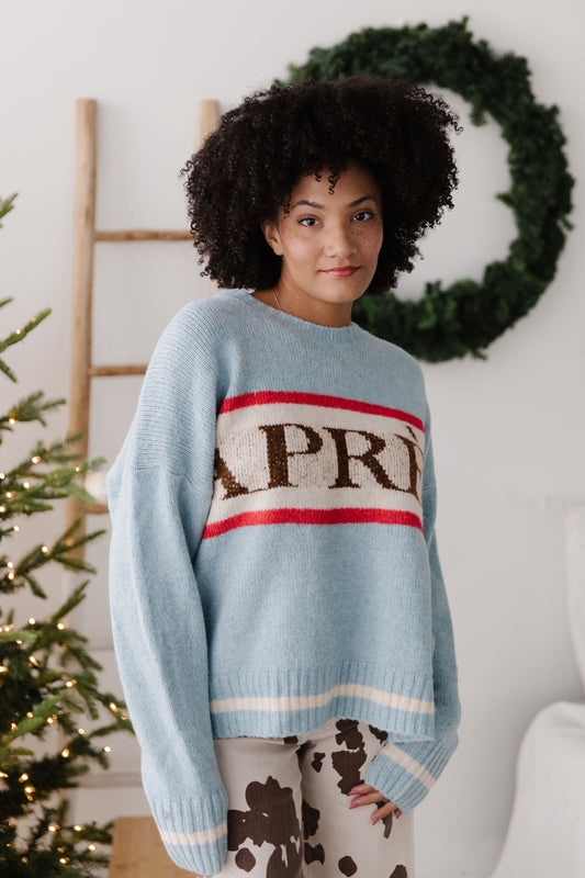 THE APRÈS GRAPHIC SWEATER IN SOFT BLUE