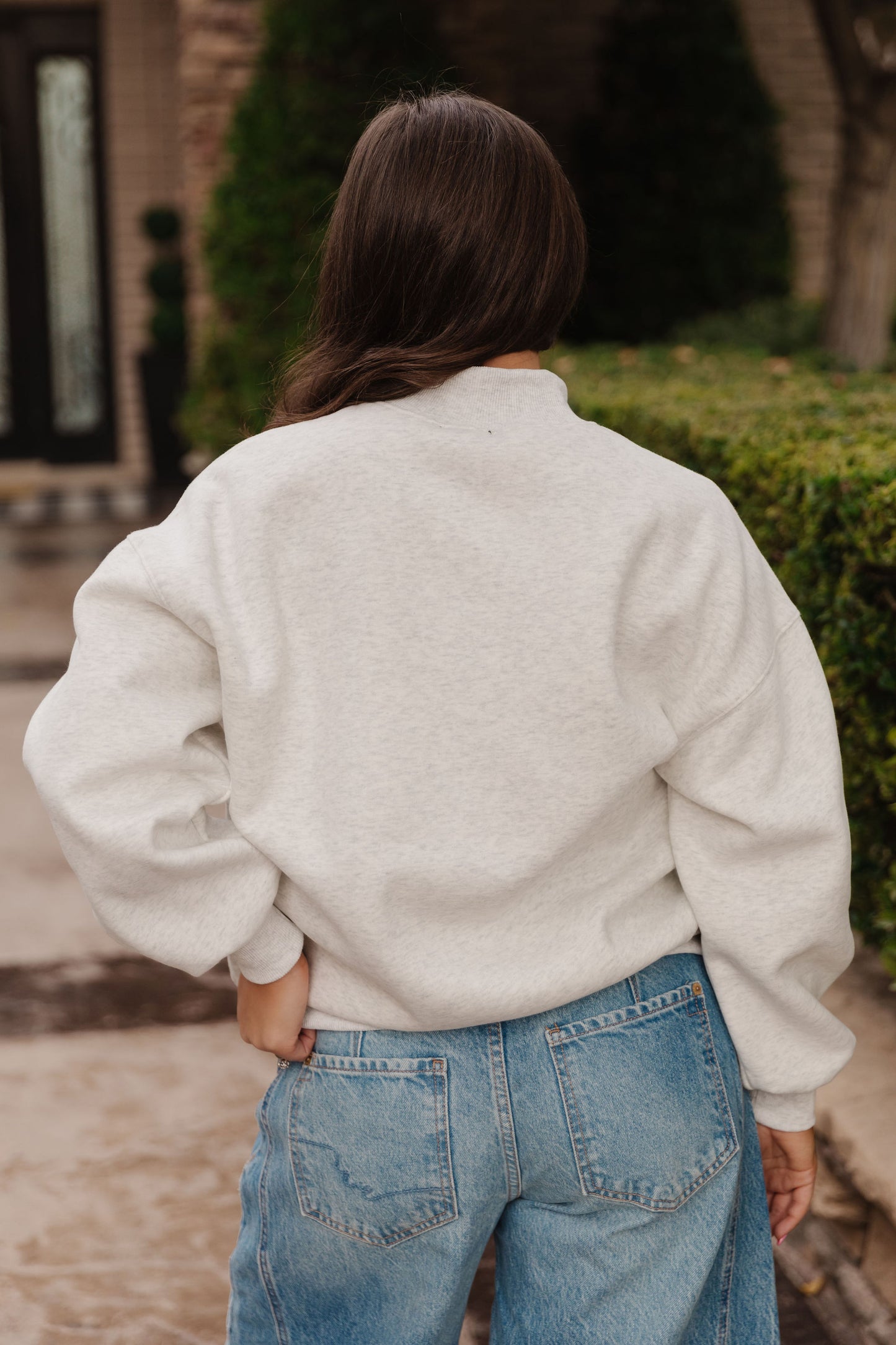 THE DIANNE MOCK NECK SWEATER IN WHITE MELANGE