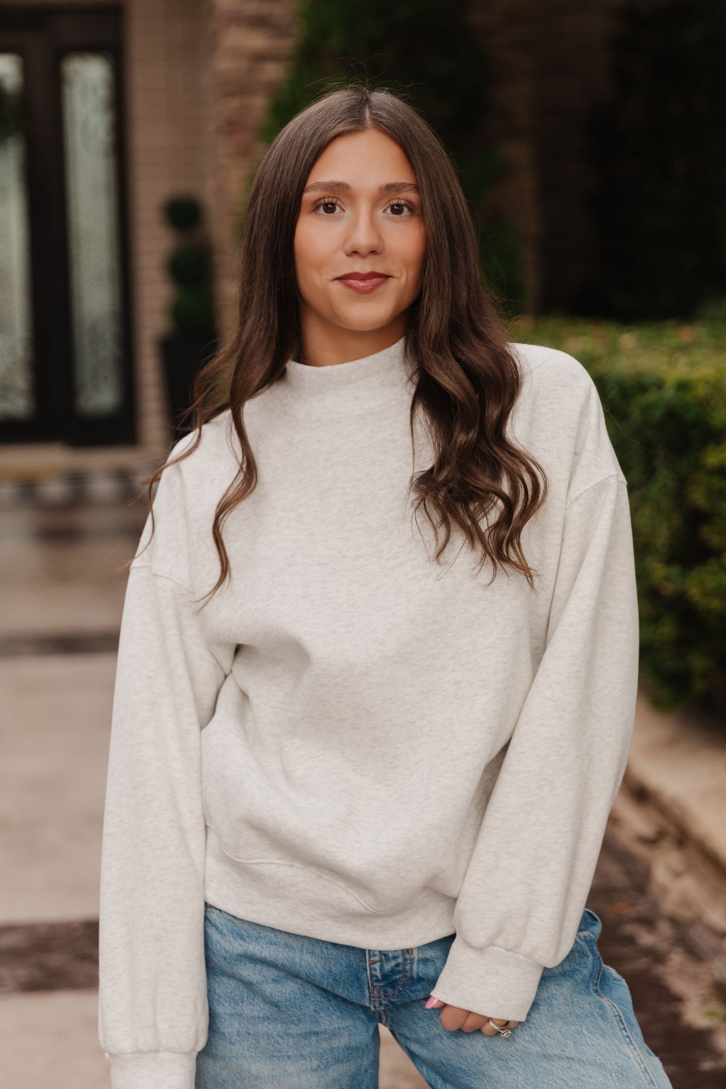 THE DIANNE MOCK NECK SWEATER IN WHITE MELANGE