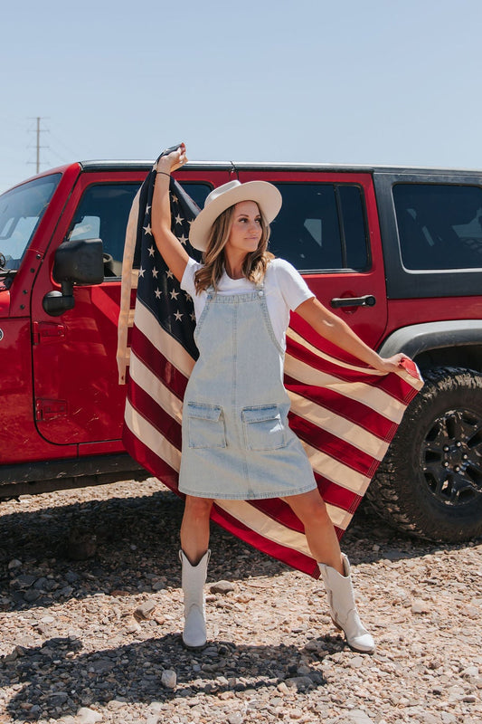 THE BRIDGER OVERALL DRESS IN LIGHT DENIM BY PINK DESERT