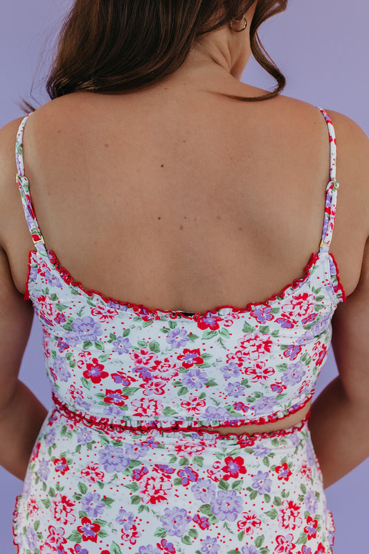 RUFFLE SWIM TOP IN CORAL BLOSSOM BY PINK DESERT X SARAH TRIPP