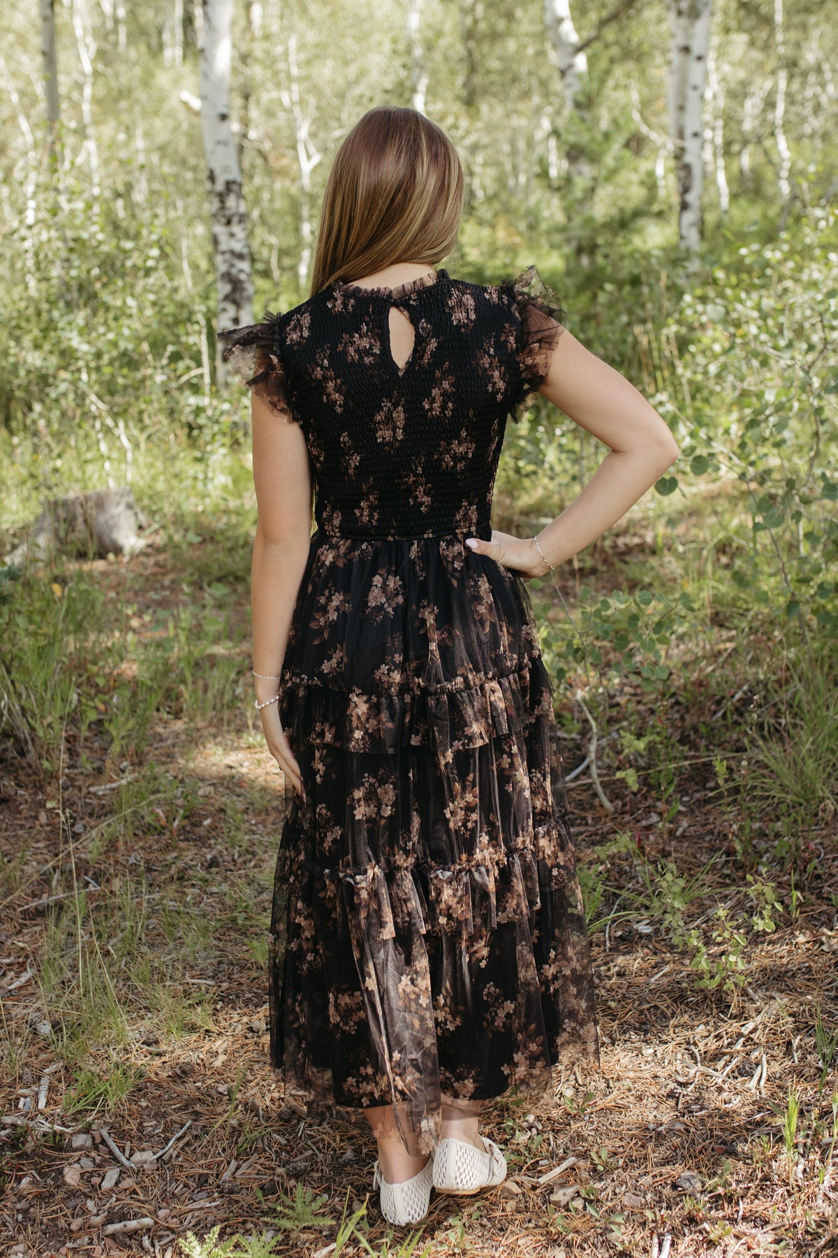THE ADDISON FLORAL TIERED SMOCKED DRESS IN BLACK
