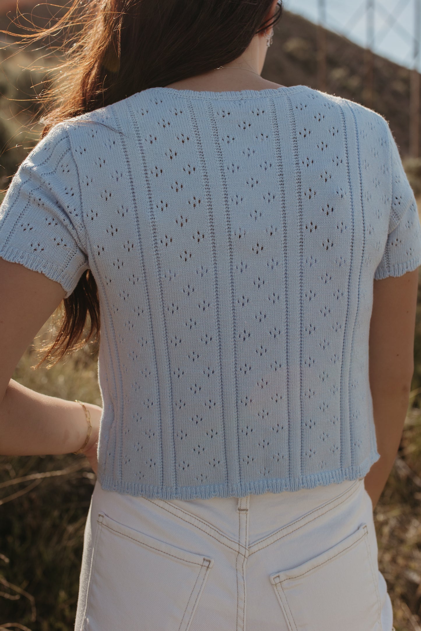 THE KAILEY TIE-FRONT KNIT TOP IN BLUE