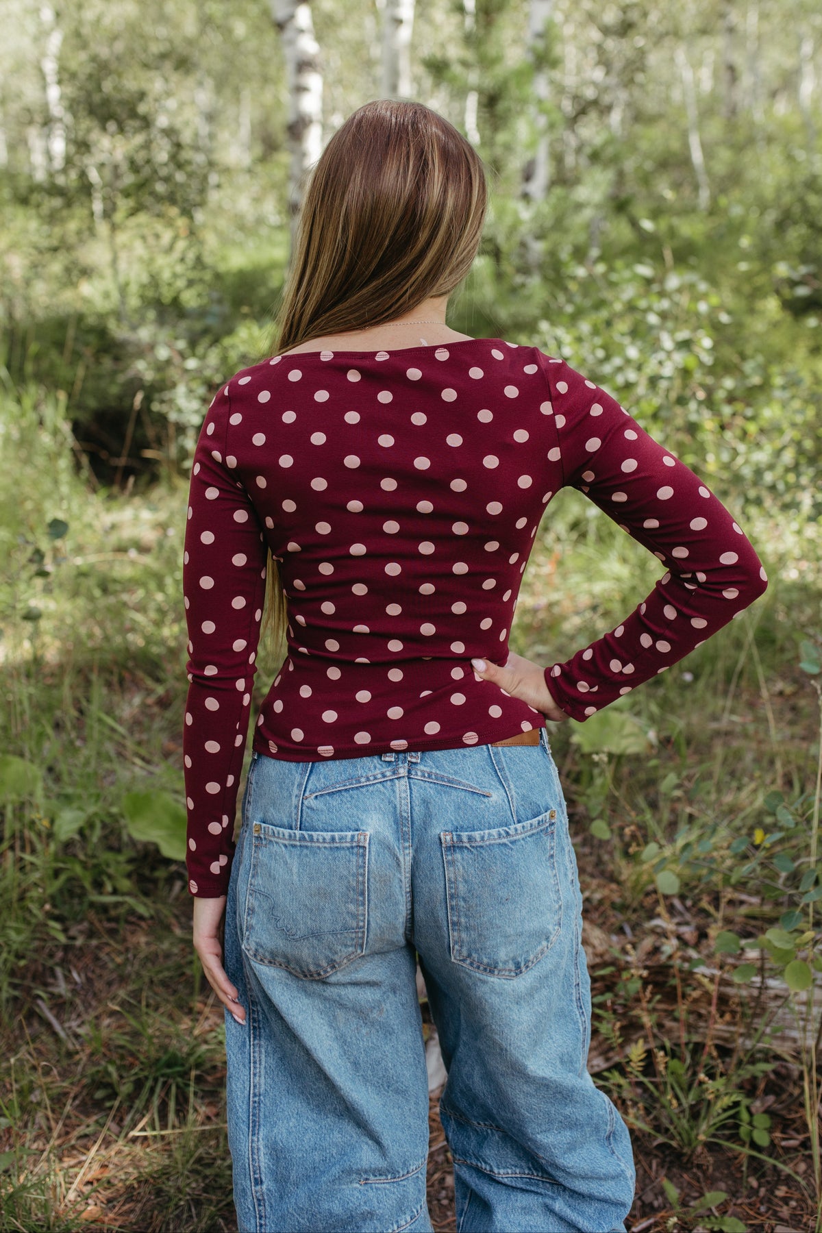 THE ROMINA POLKA DOT LONG SLEEVE KNIT TOP IN BURGUNDY