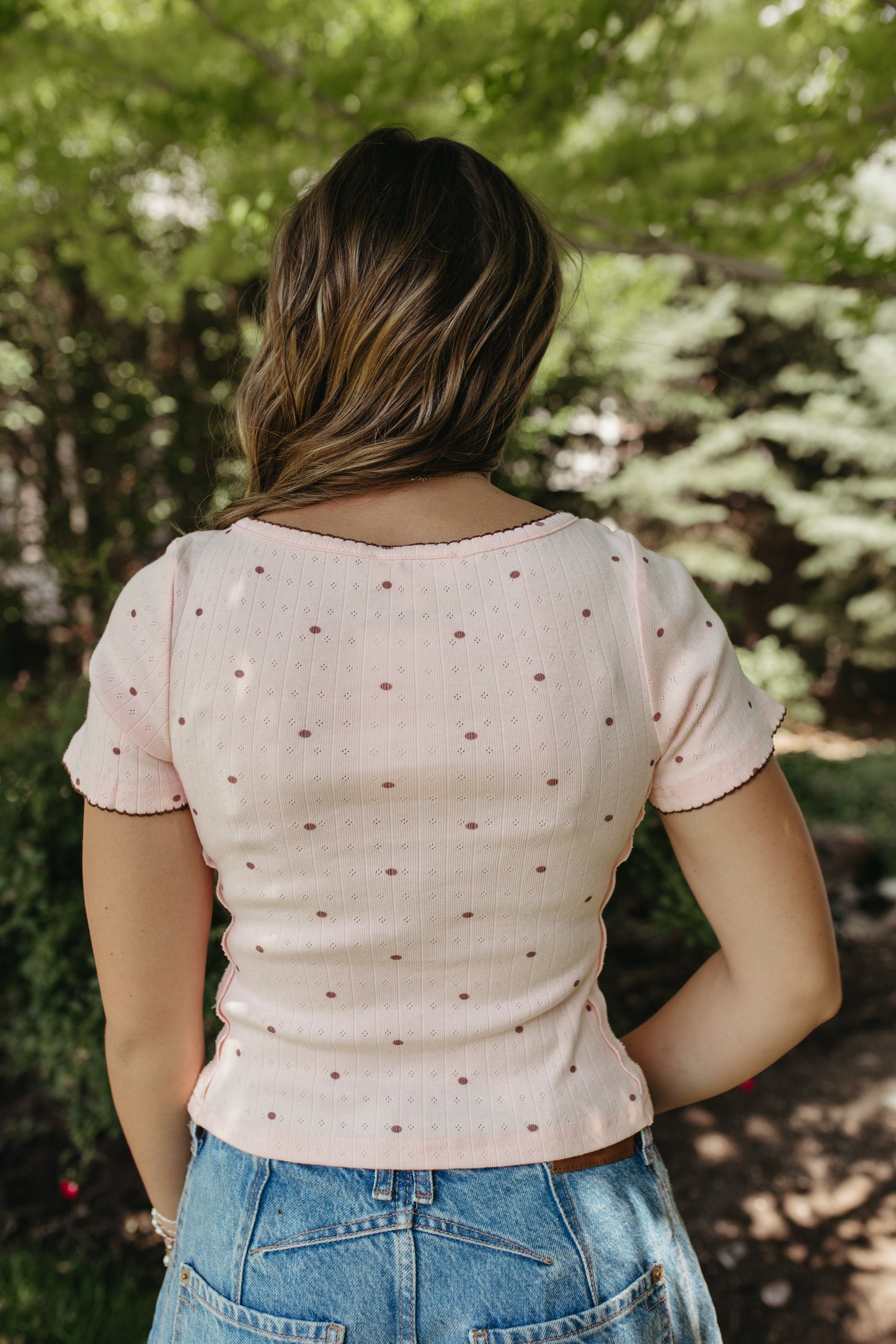 THE KAYLANI POLKA DOT BUTTON TOP IN SOFT PINK