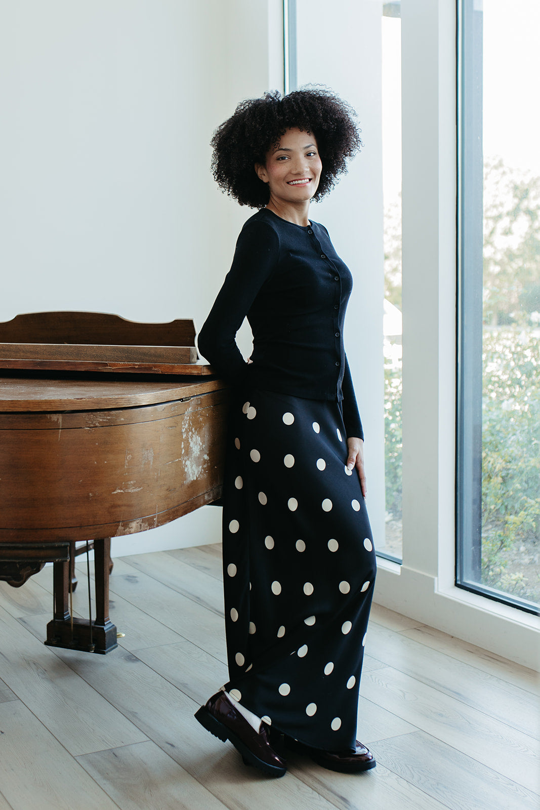 THE OAKLYNN POLKA DOT SATIN SKIRT IN BLACK