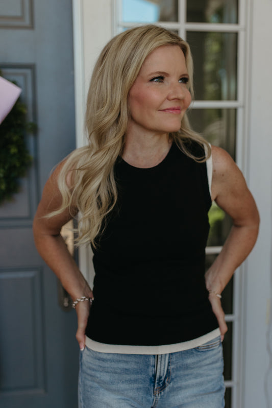 THE GRACELYNN SLEEVELESS SWEATER IN BLACK