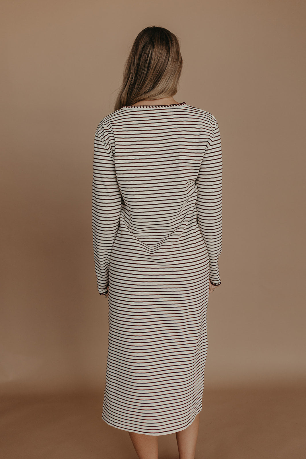 THE CORALEE STRIPED STITCH KNIT DRESS IN CREAM