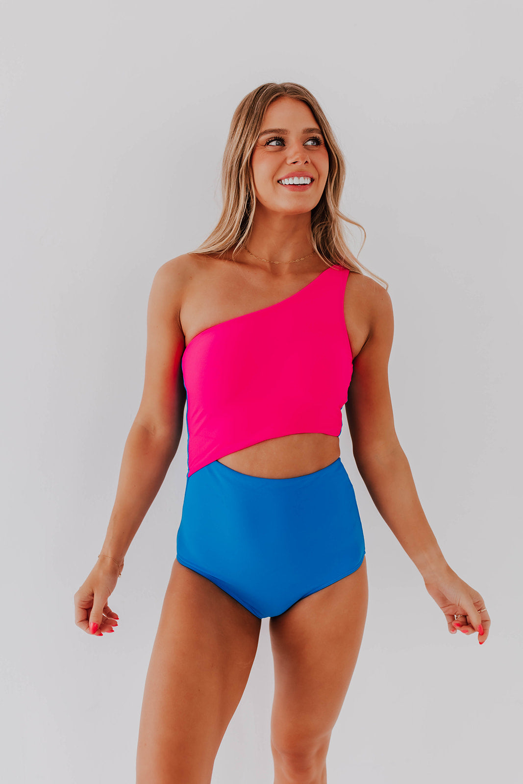 HARPER CUT OUT ONE PIECE IN NEON BLUE AND PINK COLOR BLOCK BY B  MIKESELL X PINK DESERT