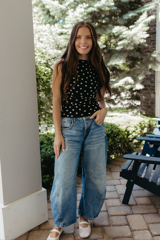 THE AINARA POLKA DOT SLEEVELESS KNIT TOP IN BLACK