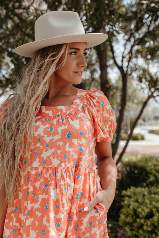 THE CALLA ORANGE FLORAL TIERED DRESS