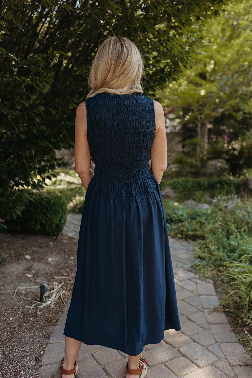 THE ROBIN FRONT TIE SMOCKED DRESS IN NAVY