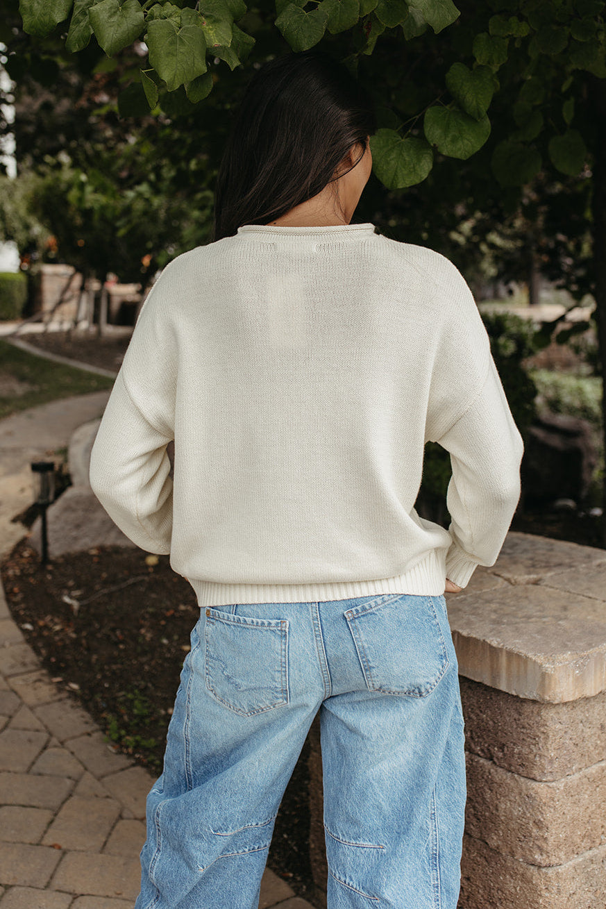THE BRIDGET PUPPY INTARSIA SWEATER IN IVORY