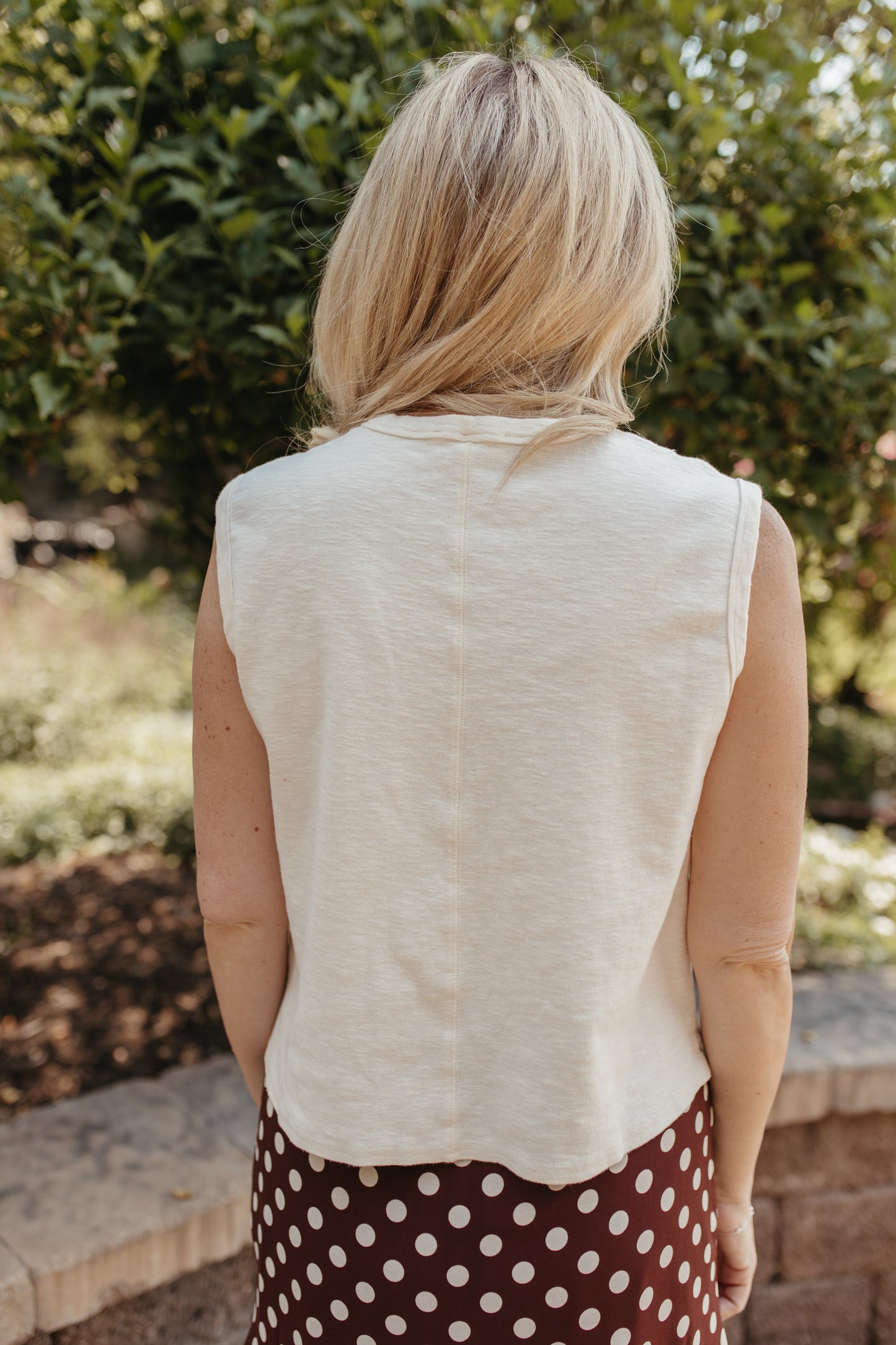 THE KHYLEE SLEEVELESS COTTON TOP IN OFF WHITE