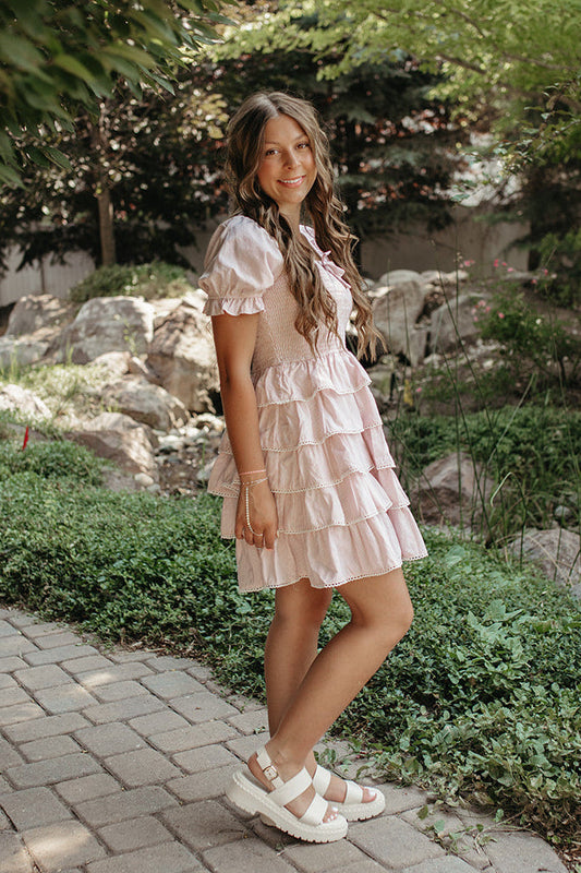 THE DULCE TIERED SMOCKED RUFFLE DRESS IN PINK
