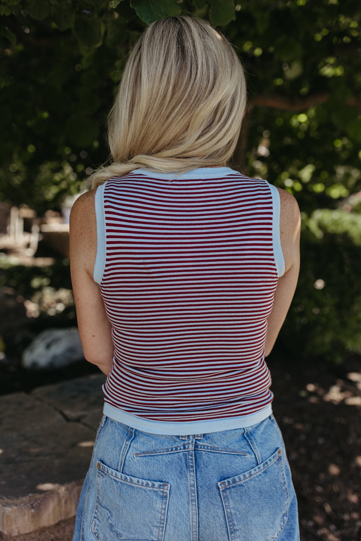 THE LORETTA STRIPE SLEEVELESS BUTTON SWEATER IN LIGHT BLUE