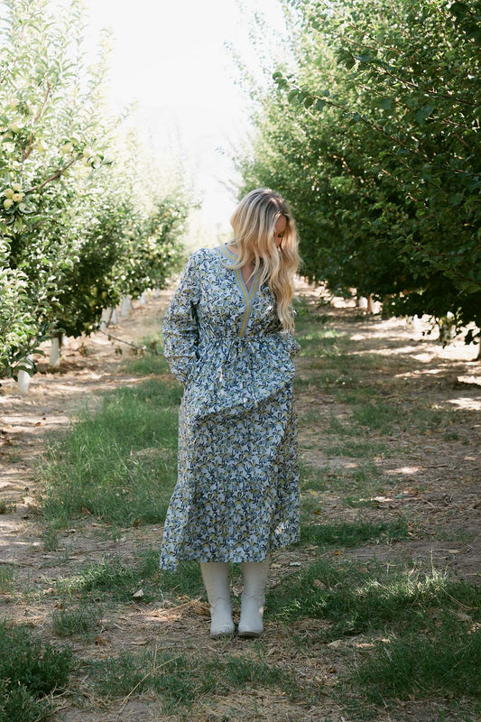 THE PAULA TIERED FLORAL DRESS IN BLUE