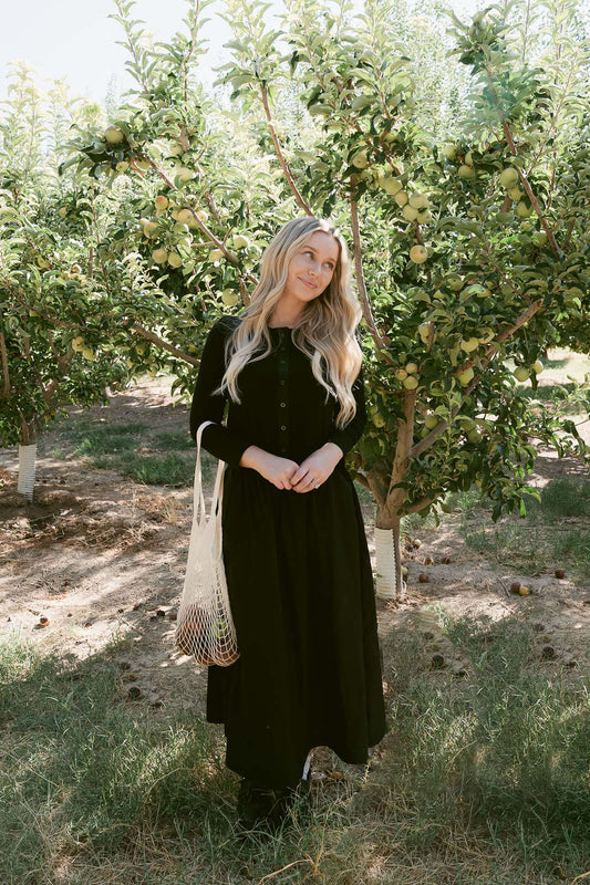 THE TRACIE CARDIGAN AND SKIRT SET IN BLACK