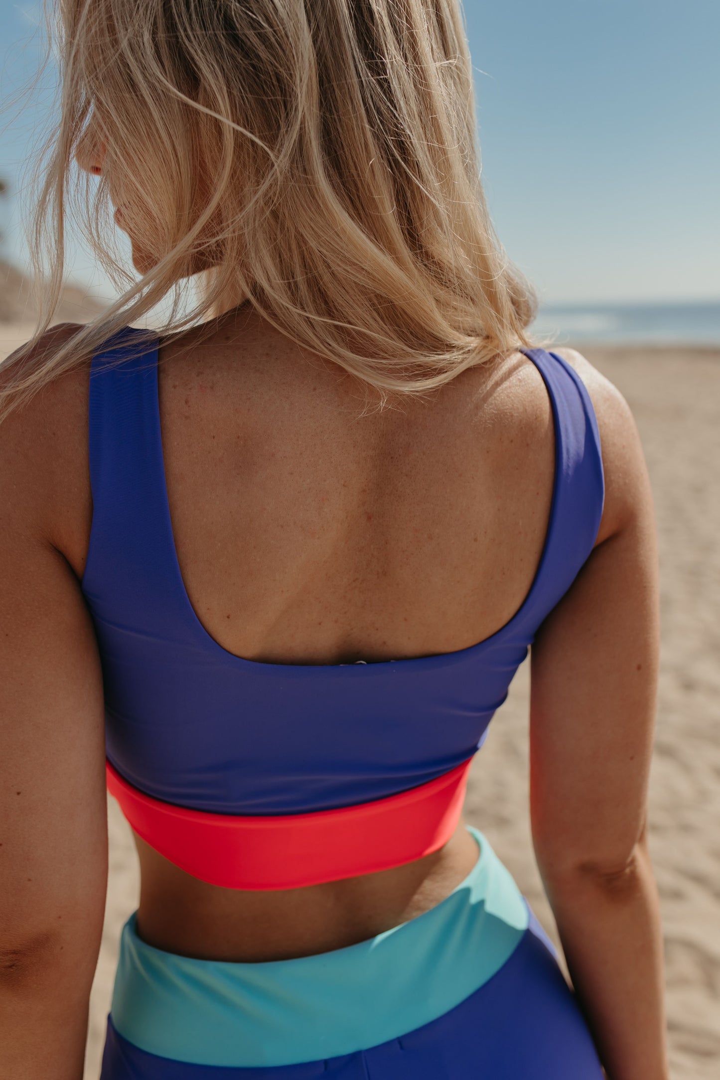 SURF RIDER SPORTY SWIM TOP IN BLUE COLORBLOCK BY PINK DESERT