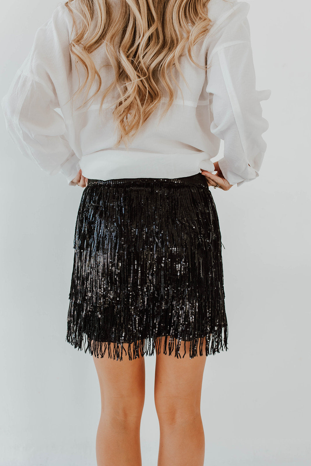 THE SEQUIN FRINGE MINI SKIRT IN BLACK