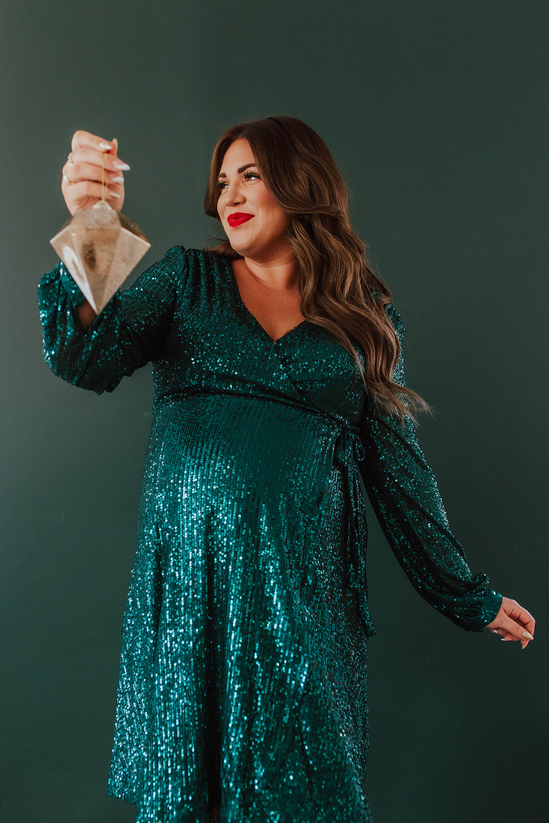 THE SPARKLY SEQUIN WRAP DRESS IN HUNTER GREEN BY SARAH TRIPP X PINK DESERT