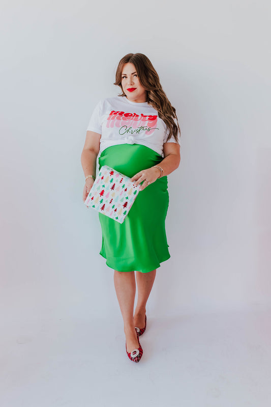 THE MISTLETOE SATIN MIDI SKIRT IN EMERALD GREEN