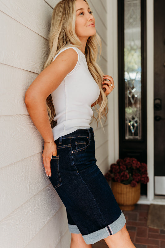 THE AINSLEY CUFFED HEM JORTS IN DARK DENIM