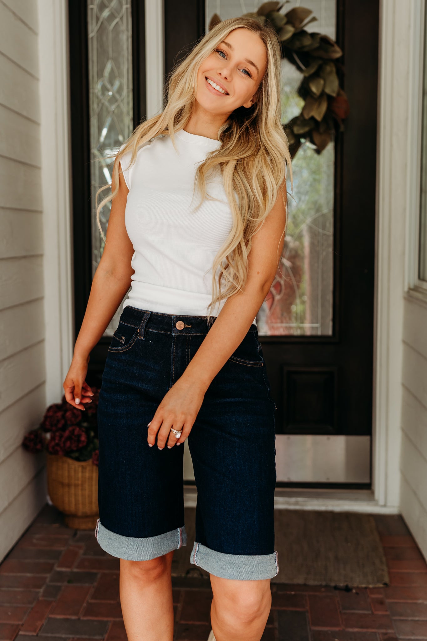 THE AINSLEY CUFFED HEM JORTS IN DARK DENIM