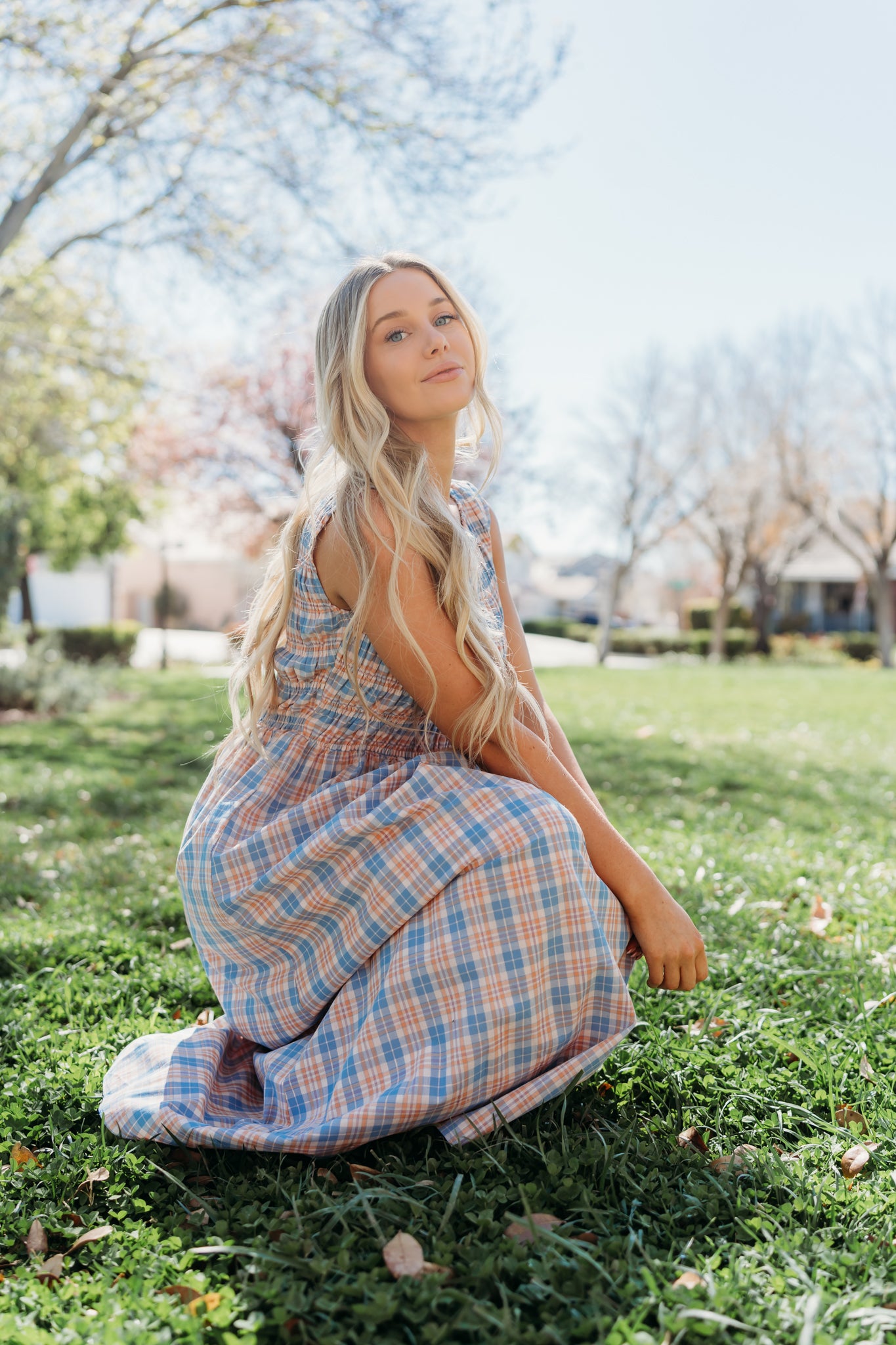 THE SAVANNAH SMOCKED PLAID DRESS IN BLUE