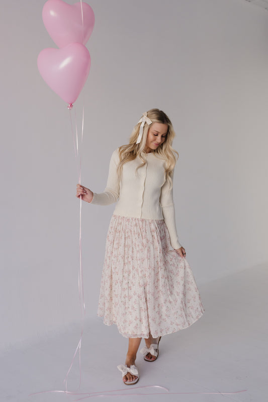 THE PATIENCE FLORAL PLEATED MIDI SKIRT IN PINK