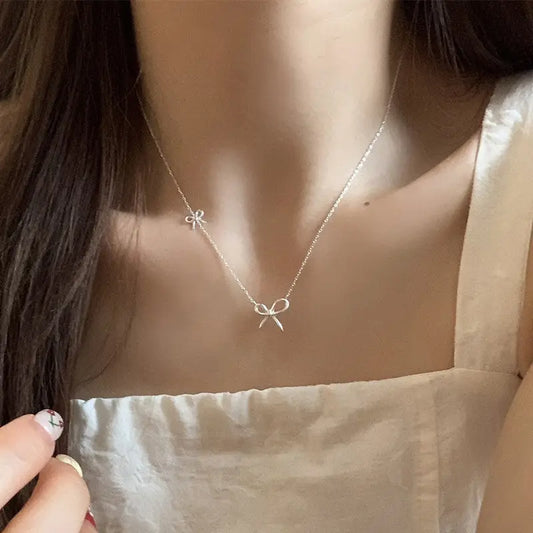THE SILVER BOW LAYERED NECKLACE
