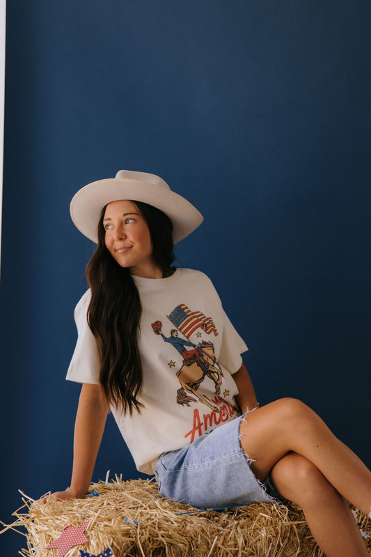 THE MAKE AMERICA COWBOY AGAIN GRAPHIC TEE IN IVORY