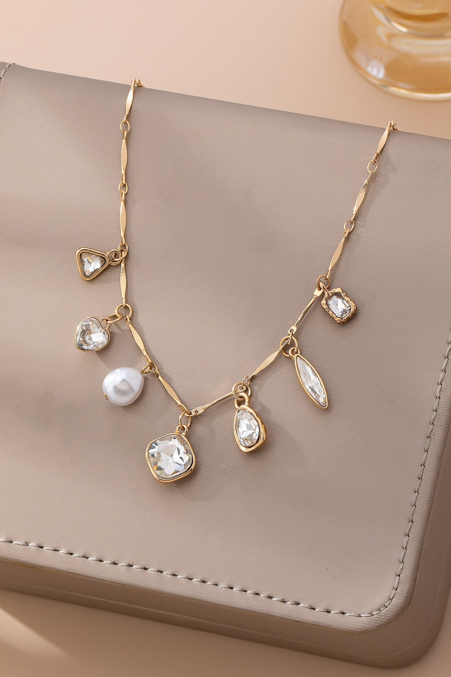THE HEIRLOOM CHARM NECKLACE