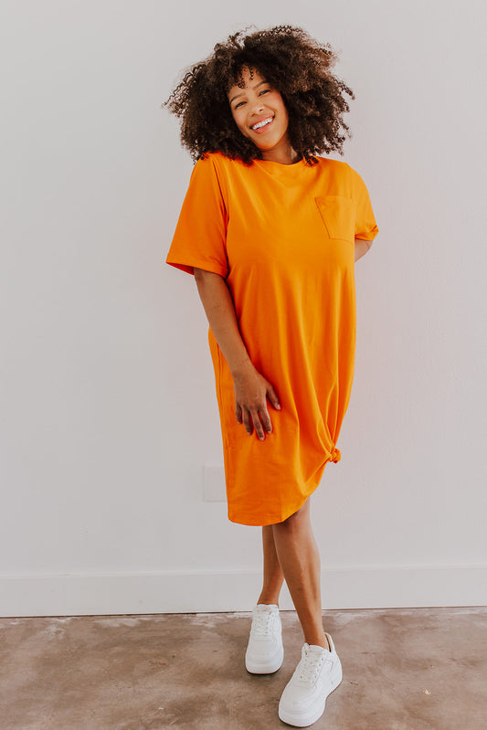THE EASY DOES IT POCKET T-SHIRT DRESS BY PINK DESERT IN ORANGE