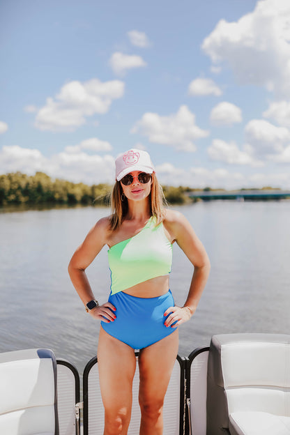 RILEY CUT OUT ONE PIECE IN NEON BLUE AND GREEN COLOR BLOCK BY BETSY MIKESELL X PINK DESERT