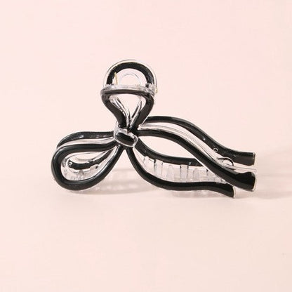 THE BOW CLAW CLIP (2 COLORS)