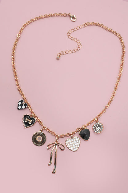 THE DARK COQUETTE CHARM NECKLACE IN GOLD