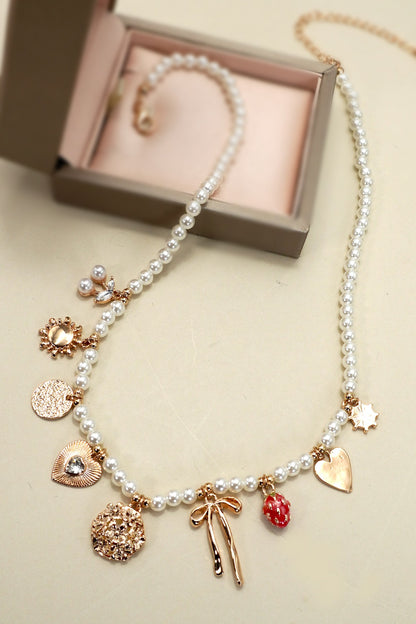 THE PEARL BEADED CHARM NECKLACE IN GOLD