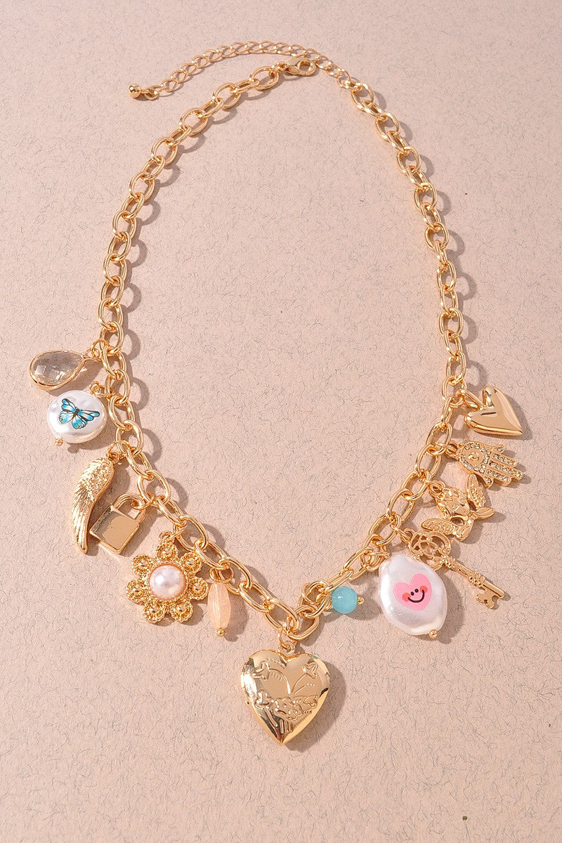 THE HAMDA CHARM NECKLACE IN GOLD