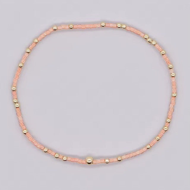 BOHO PEACH AND GOLD BEADED BRACELET