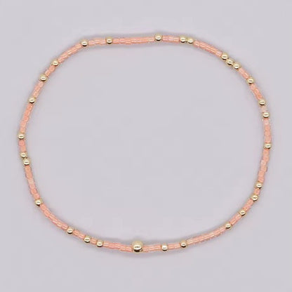 BOHO PEACH AND GOLD BEADED BRACELET